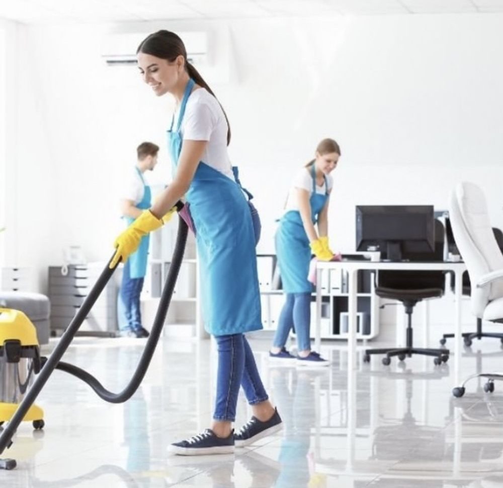 Cleaning team at work in an office